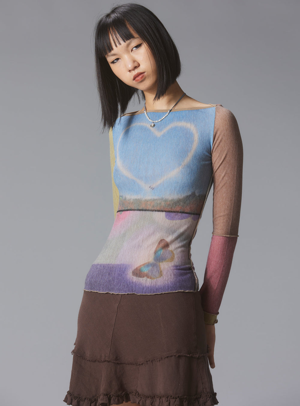 Skye Top Y2K allover-print mesh top with custom artwork