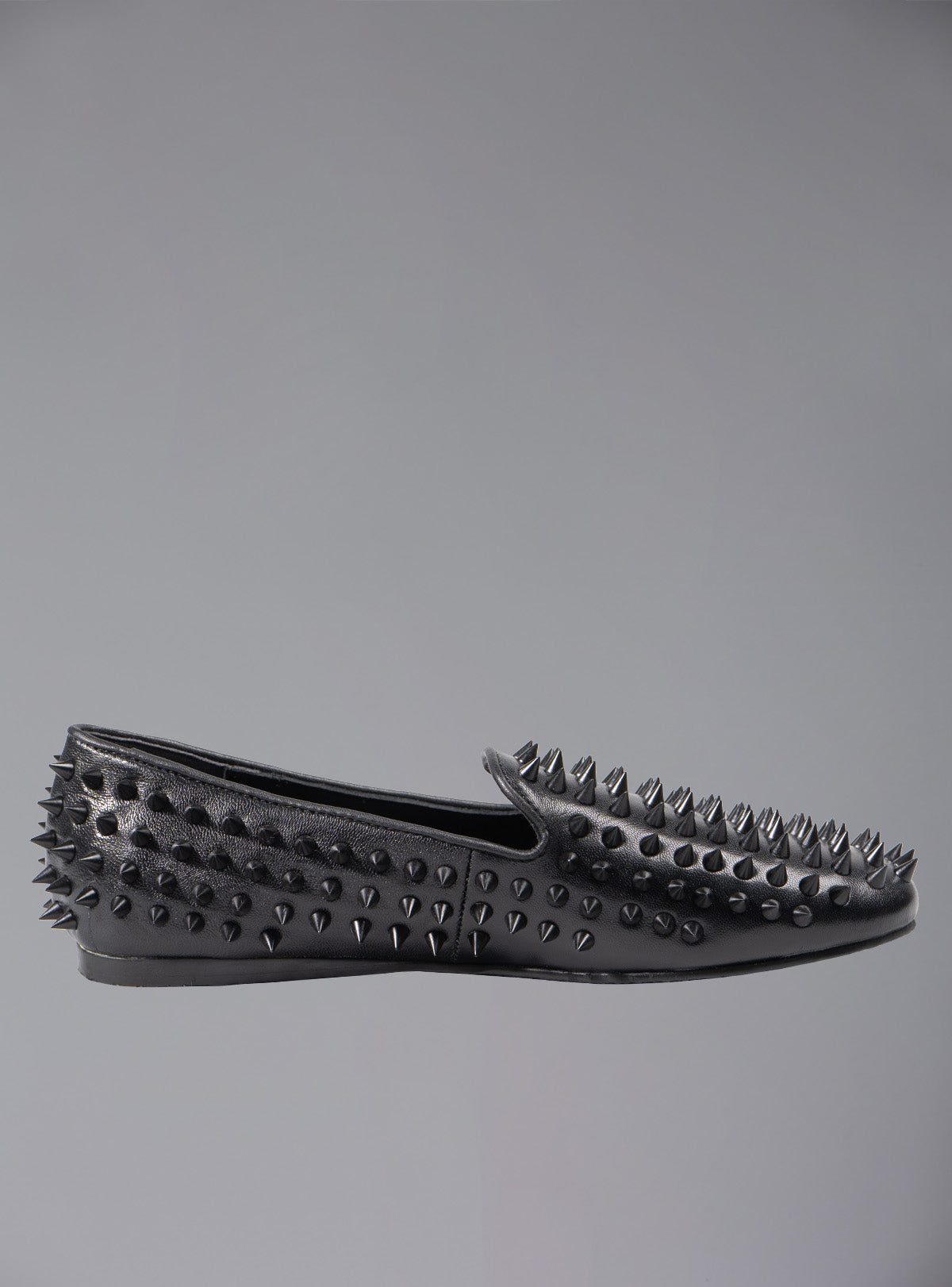 UNIF Hellraiser spiked slip on loafer in tonal black on black colorway.