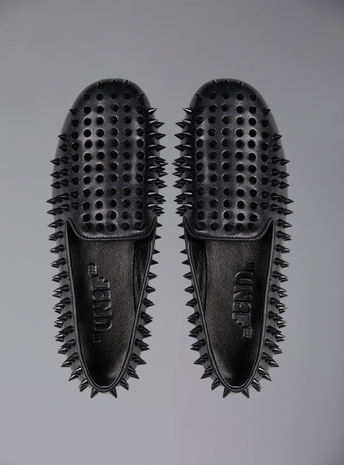 UNIF Hellraiser spiked slip on loafer in tonal black on black colorway.