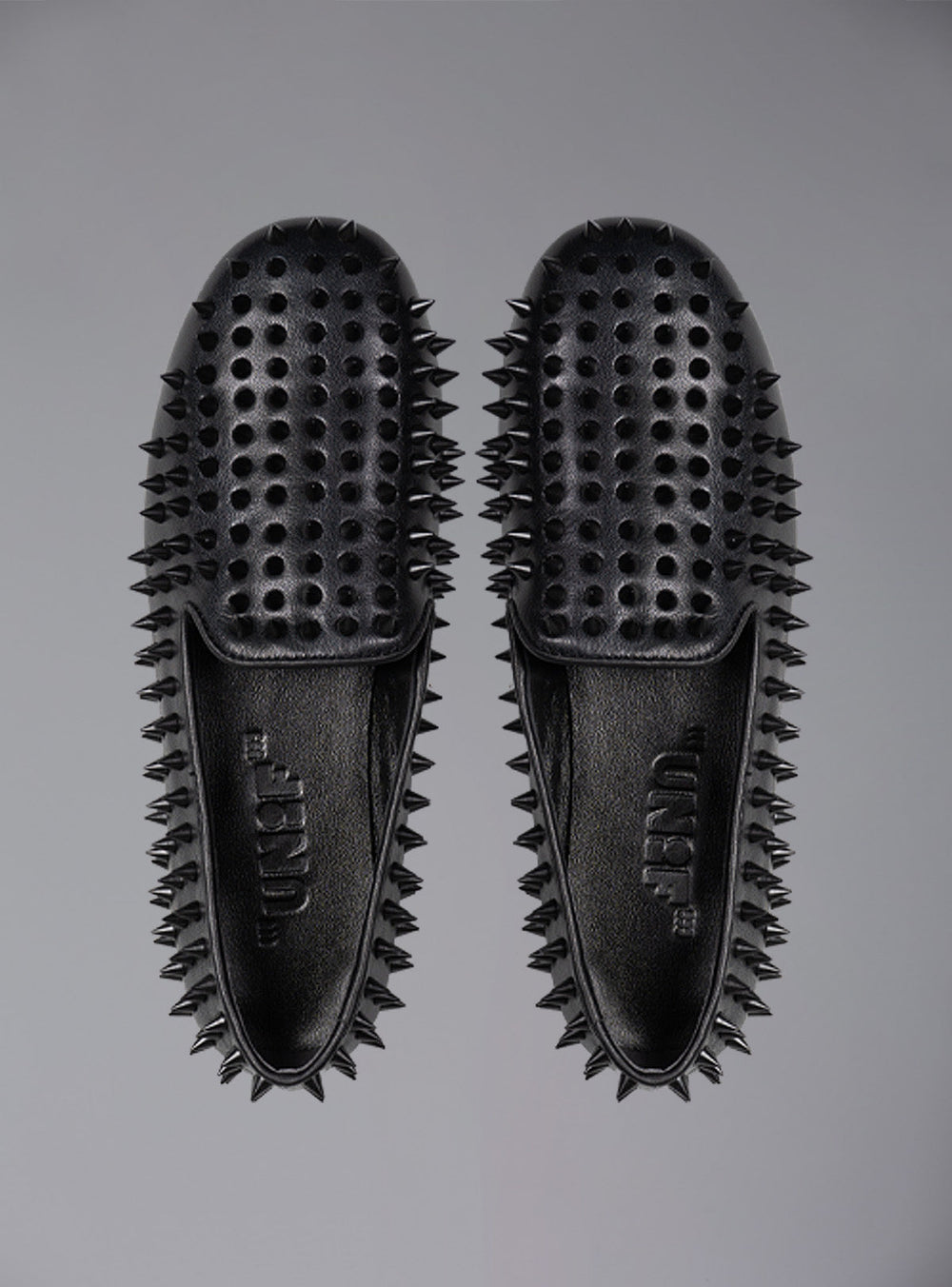 UNIF Hellraiser spiked slip on loafer in tonal black on black colorway.