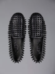 UNIF Hellraiser spiked slip on loafer in tonal black on black colorway.