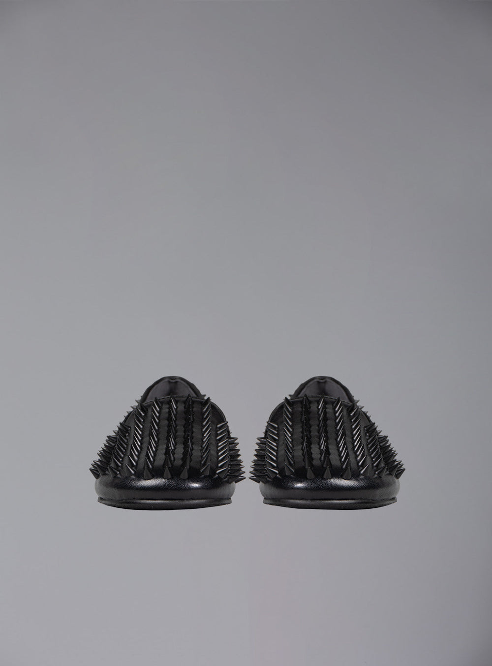 UNIF Hellraiser spiked slip on loafer in tonal black on black colorway.