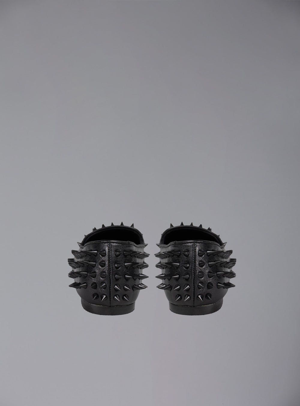UNIF Hellraiser spiked slip on loafer in tonal black on black colorway.